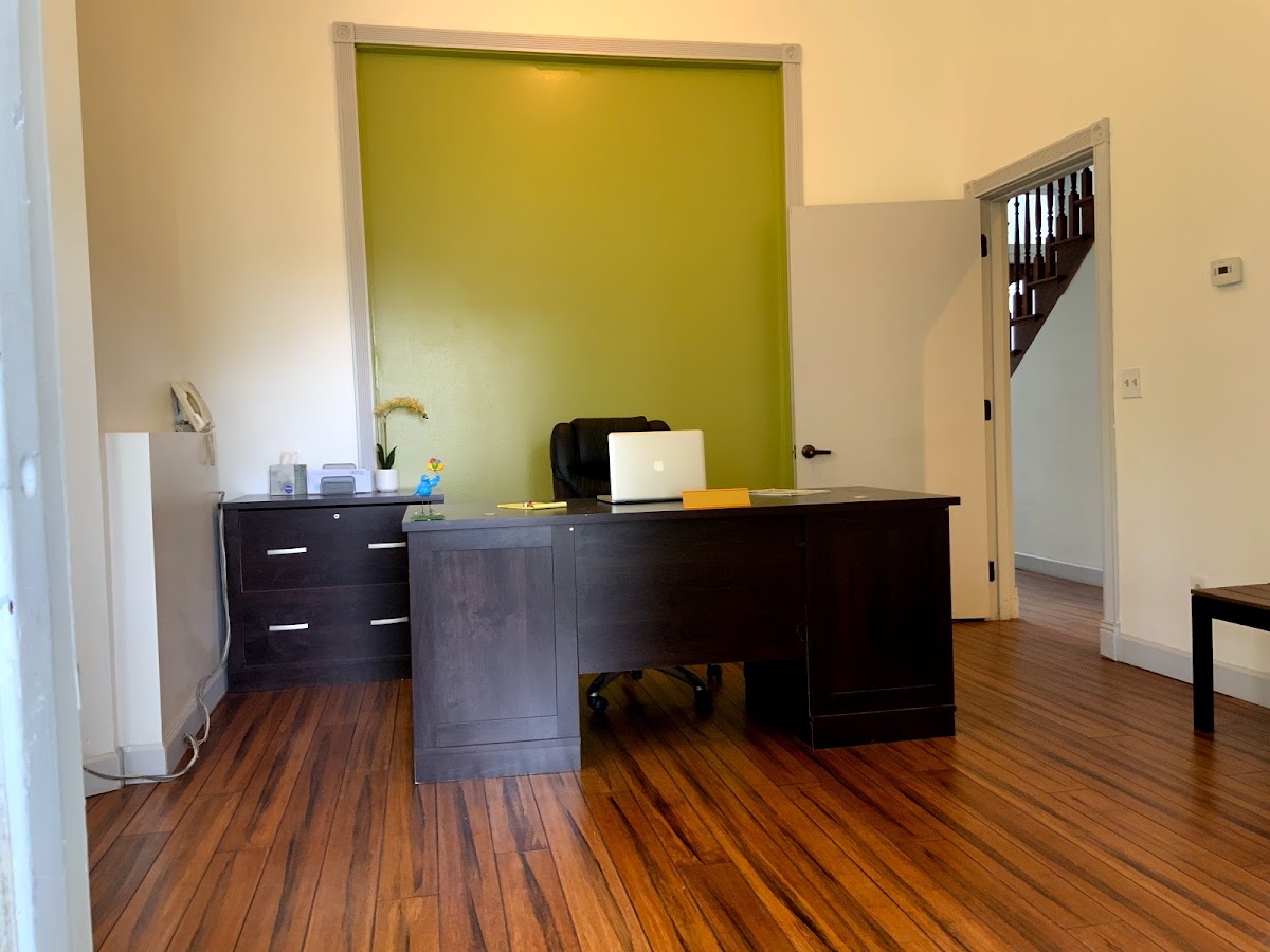 1447 East Grand Boulevard: furnished office with wood flooring