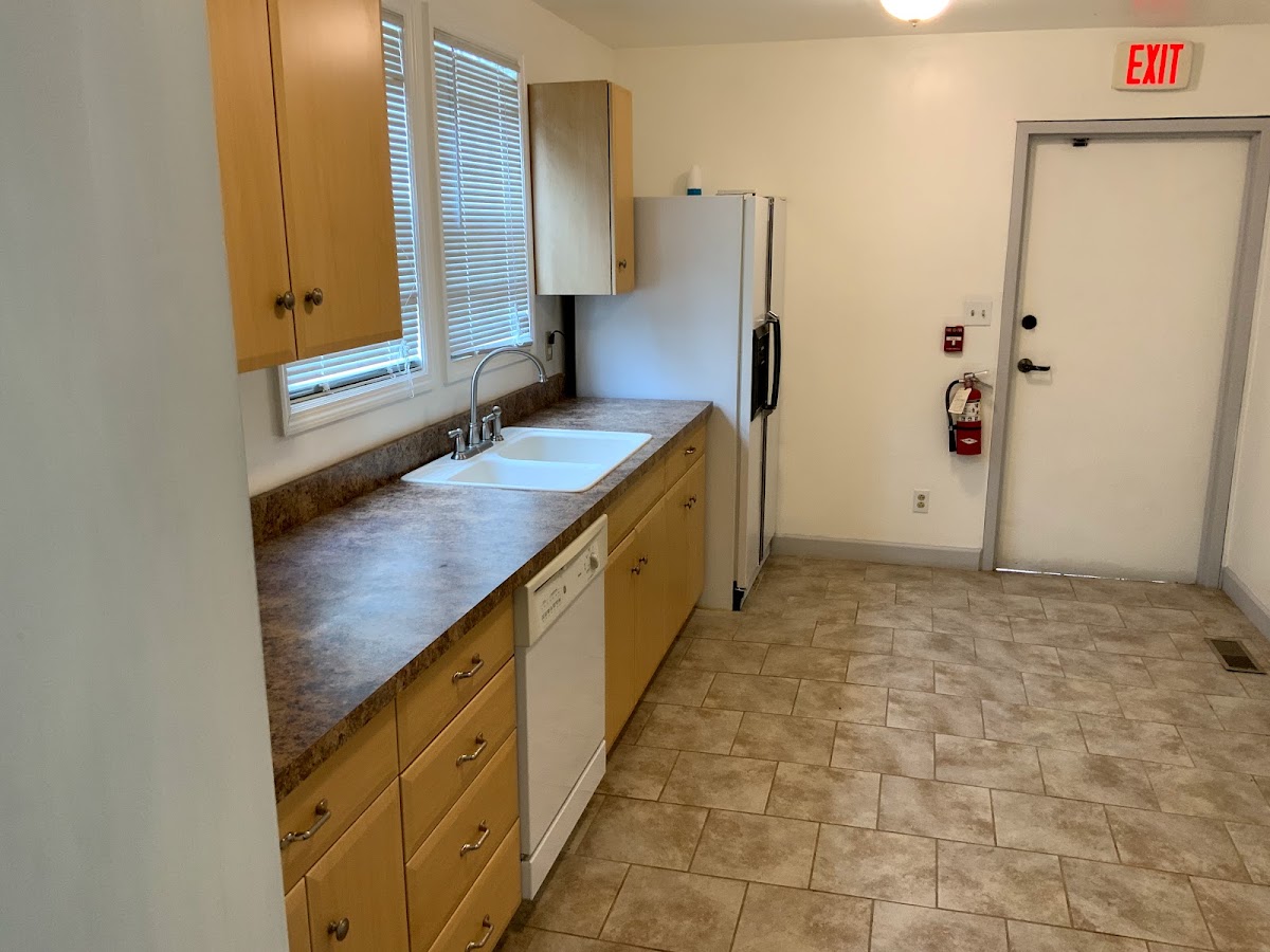 1447 East Grand Boulevard: kitchen with cabinets and counters