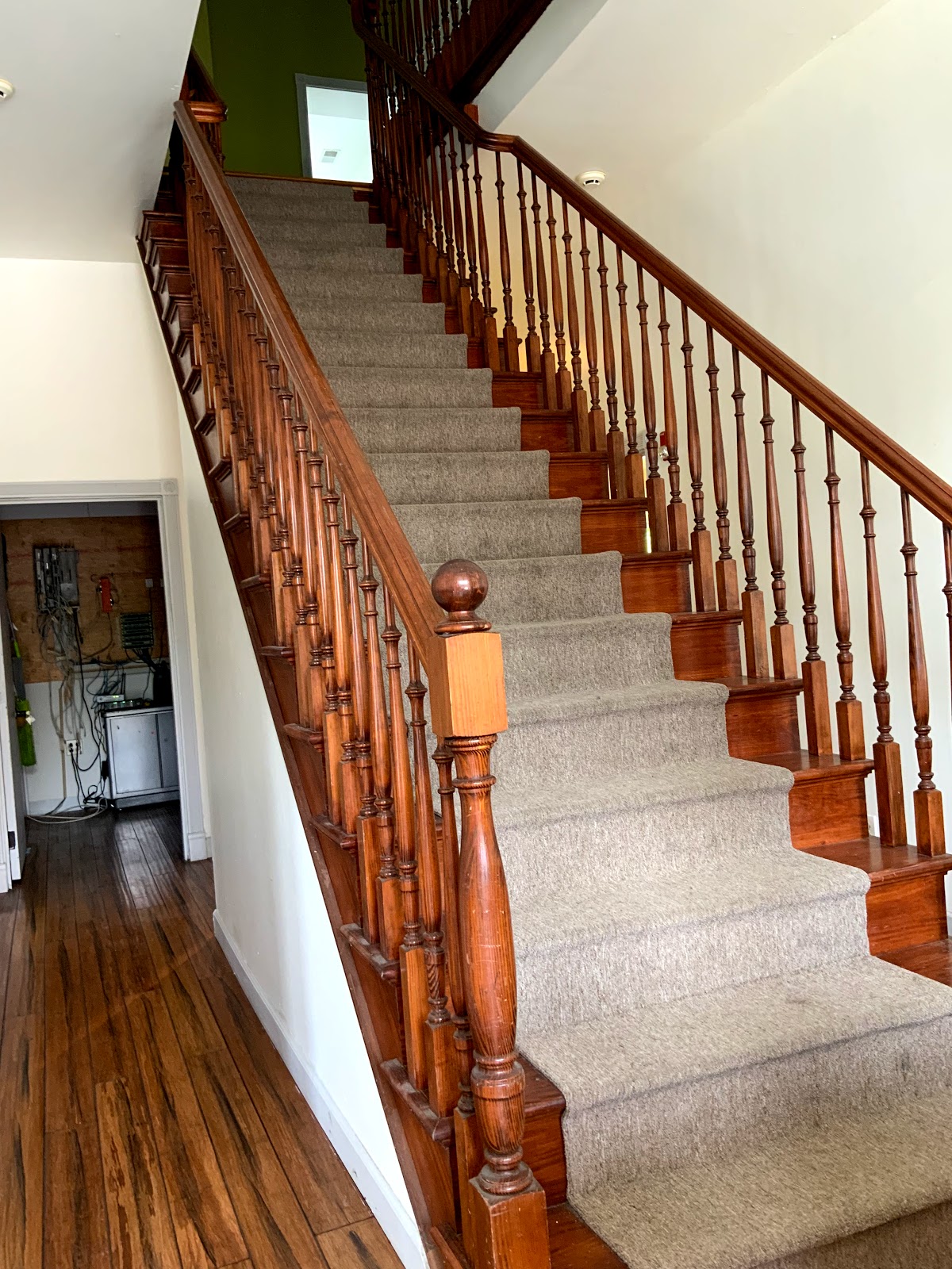 1447 East Grand Boulevard: wood staircase and hallway