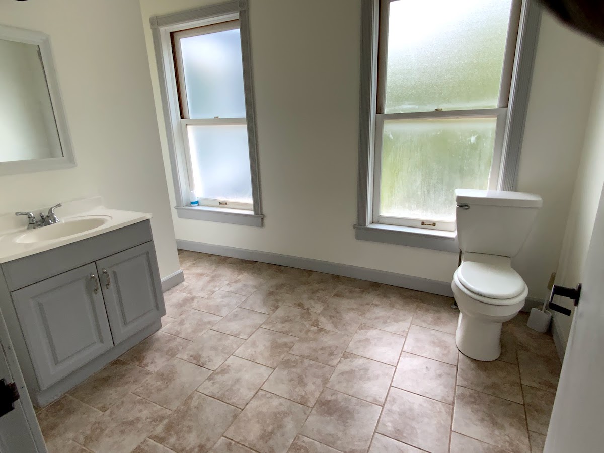 1447 East Grand Boulevard: bathroom with vanity and tile flooring