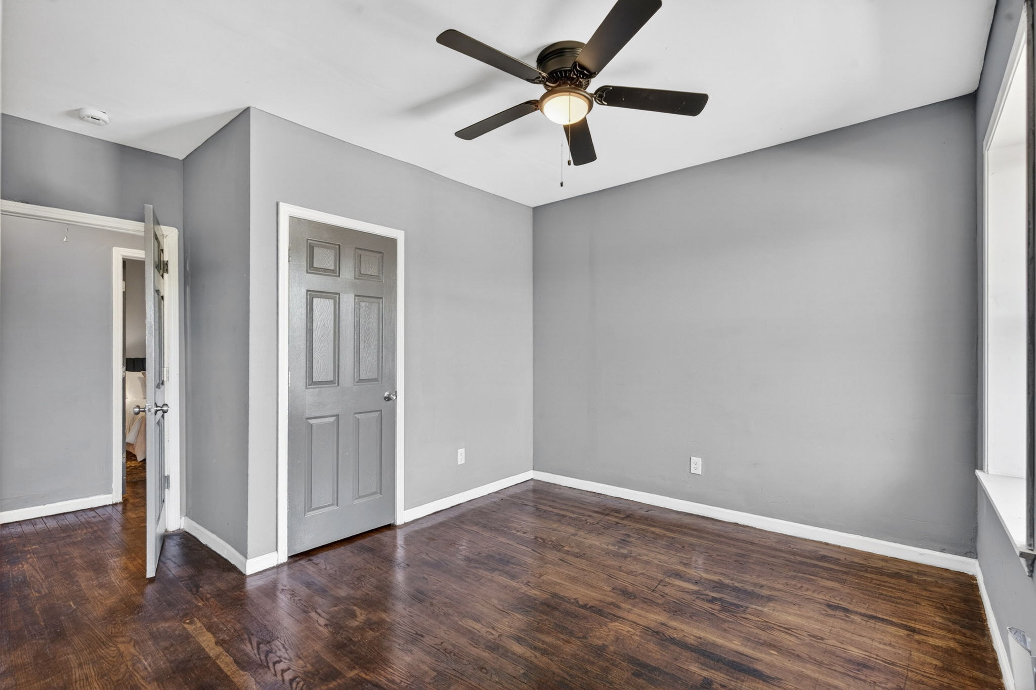 4404 Floriss Place: interior room with wood floors
